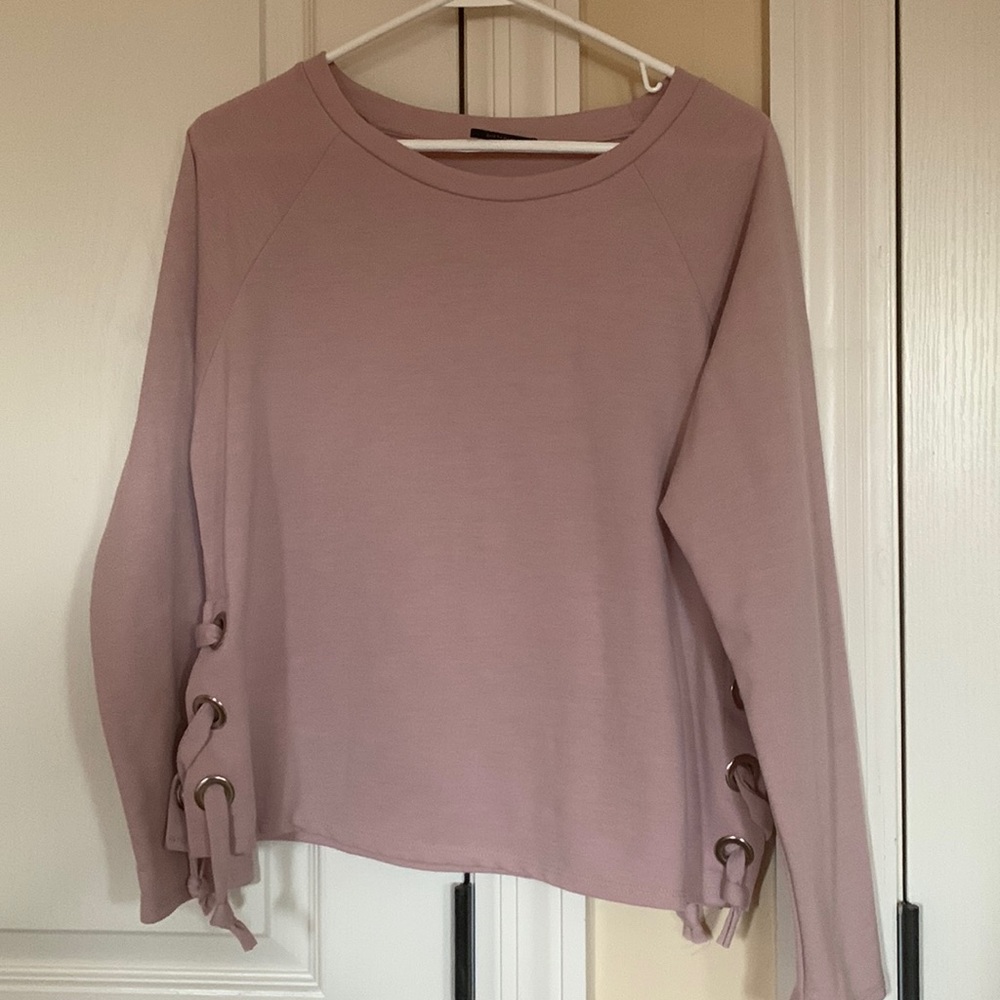 COPY - Ellie Tahari dusty pink top with cute side details.